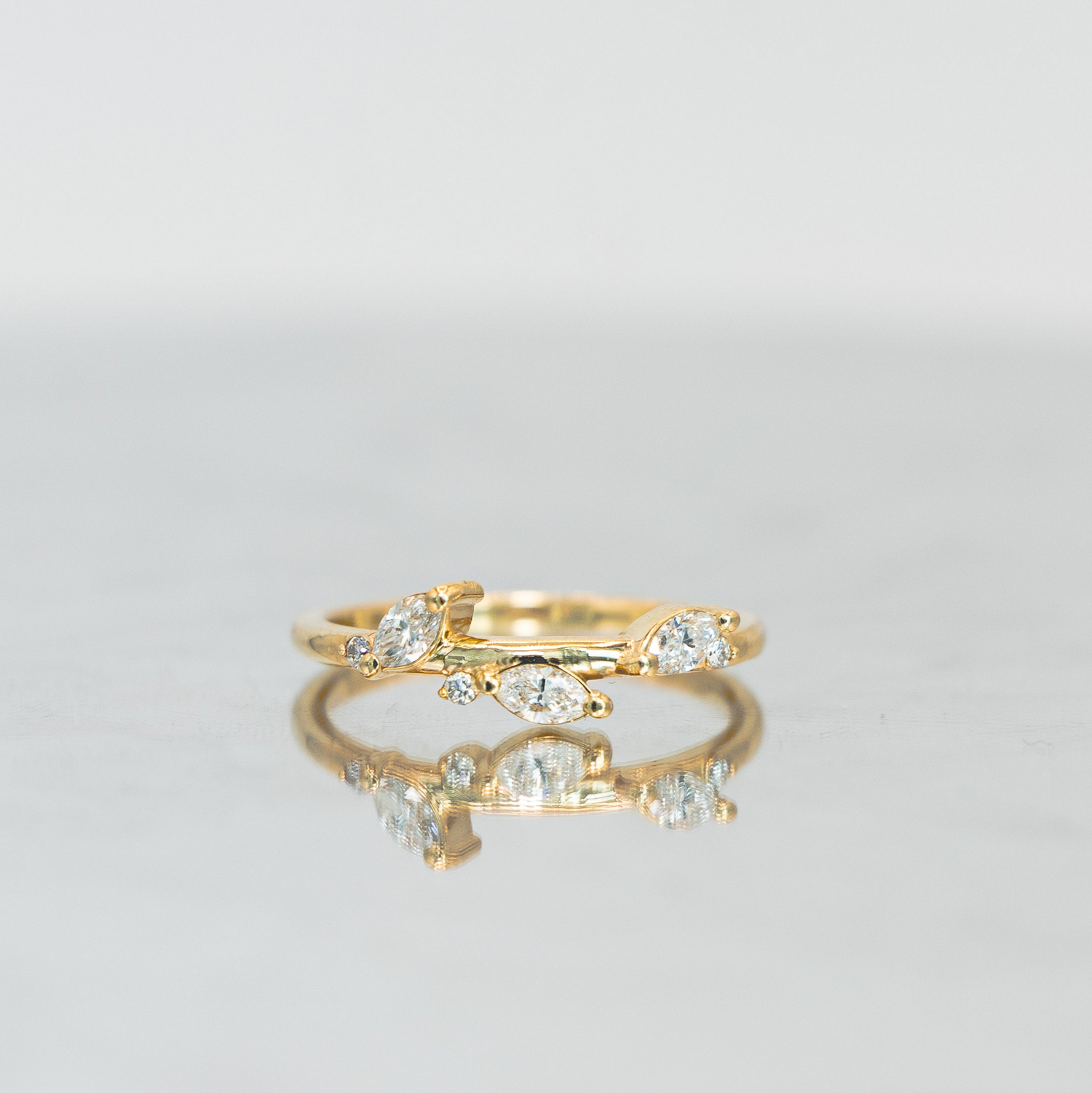 Elegant rings collection with dainty designs, gemstone accents, and timeless engagement styles