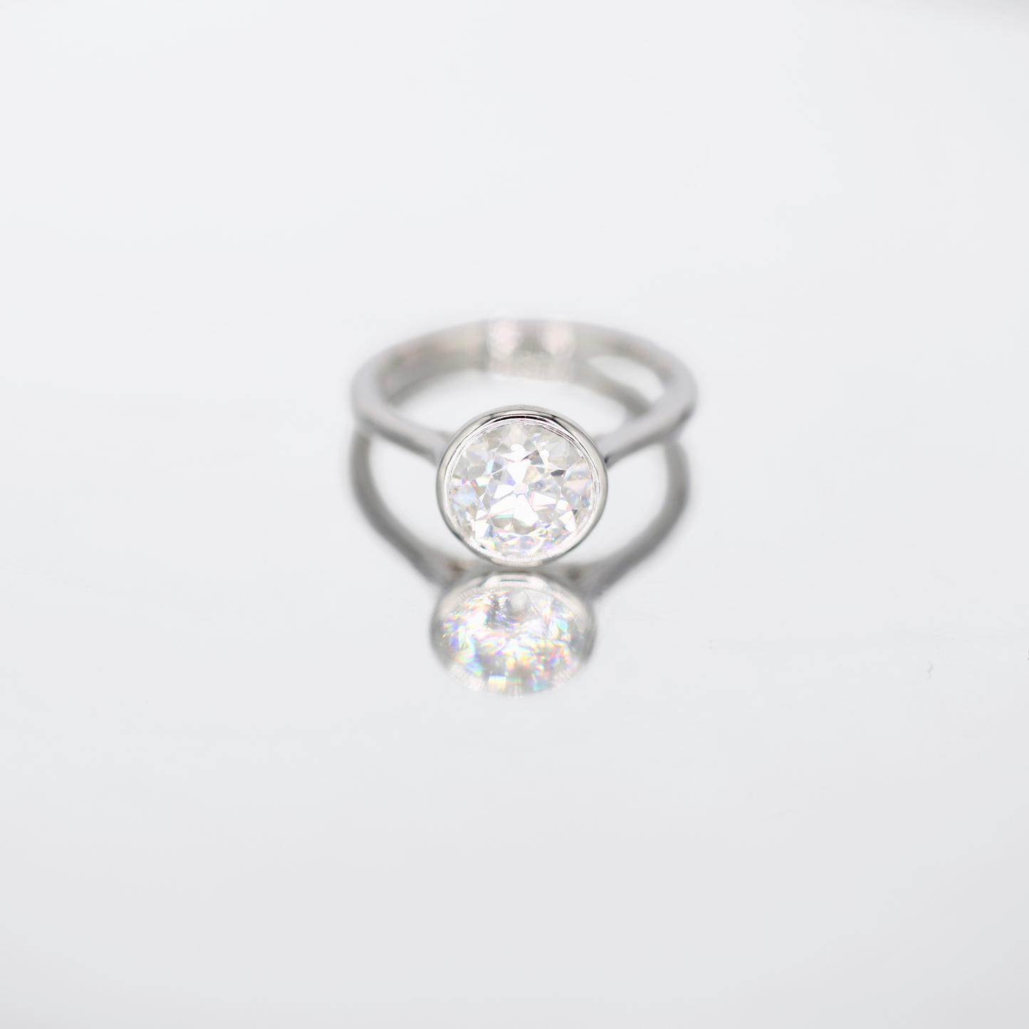 Vesper | Bezel-Set Old European Cut Moissanite Ring – Vintage-inspired ring featuring an Old European cut moissanite in a sleek bezel setting. Crafted in solid gold for a timeless and elegant look